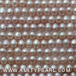 3787 freshwater potato pearl strand about 4.5-5mm peach pink